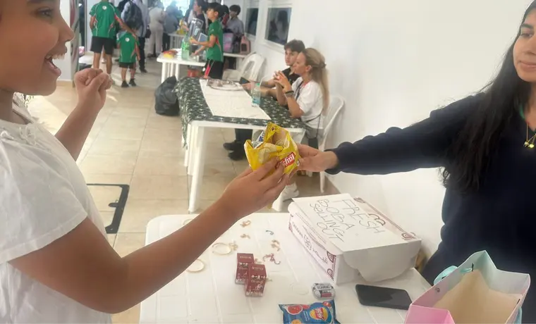 Students at a fundraiser stall