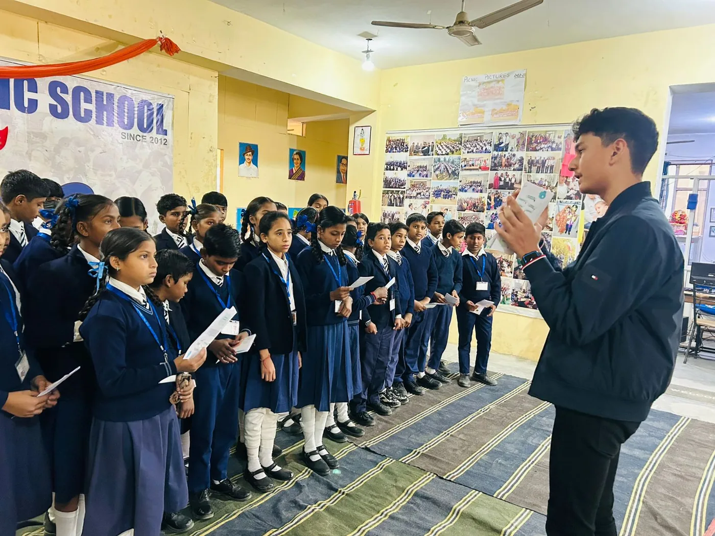 An Avana volunteer leading a session with students at a partner school
